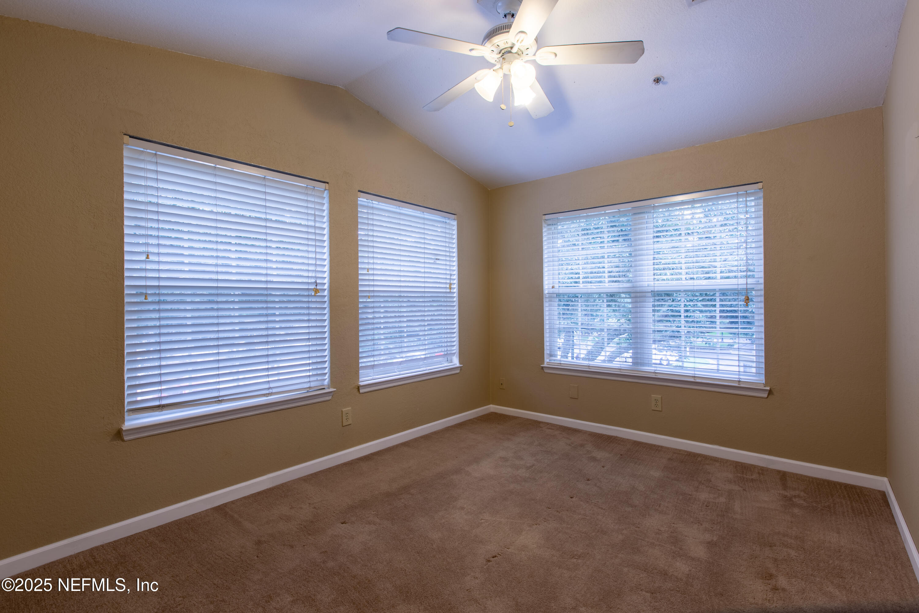 13810 Sutton Park Drive North, Unit 1120 Jacksonville, FL 32224 - Photo 17 of 24 a view of an empty room with a window