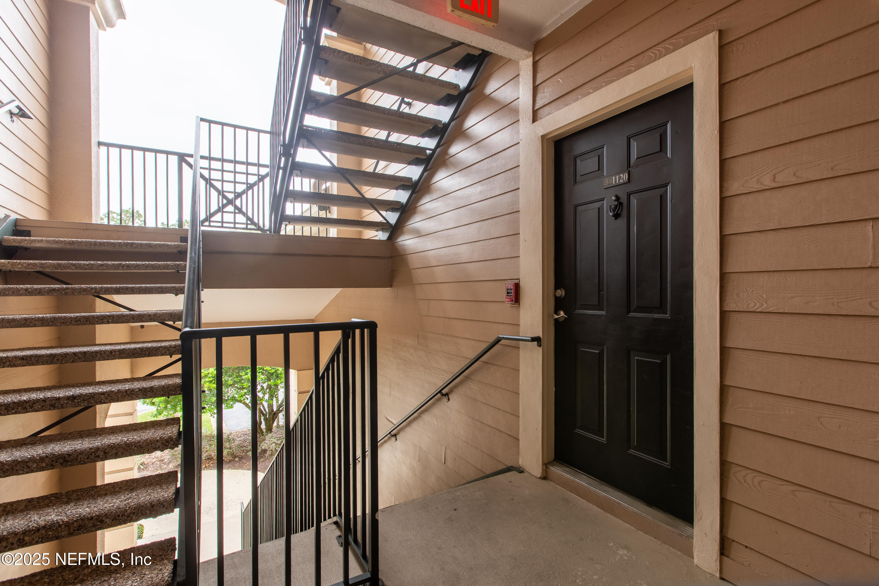 13810 Sutton Park Drive North, Unit 1120 Jacksonville, FL 32224 - Photo 22 of 24 a view of balcony with stairs