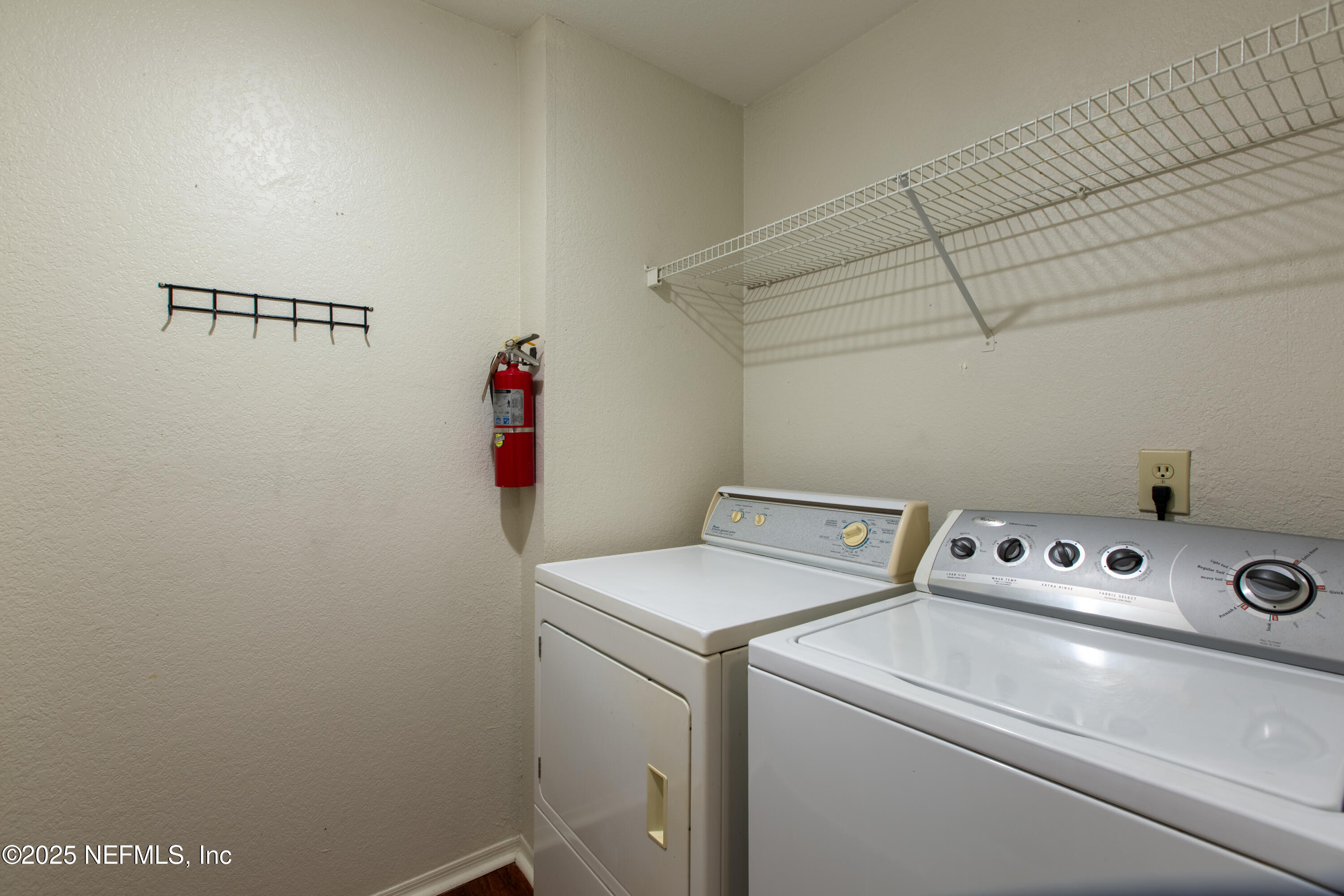 13810 Sutton Park Drive North, Unit 1120 Jacksonville, FL 32224 - Photo 5 of 24 a utility room with dryer and washer