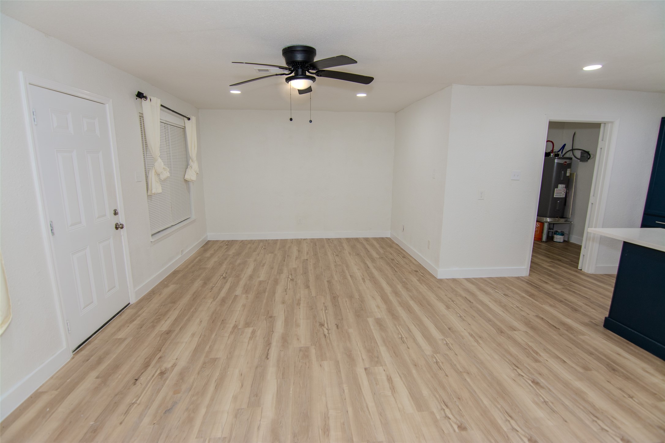 10815 Ritow Street Houston, TX 77089 - Photo 3 of 12 a view of a livingroom with wooden floor