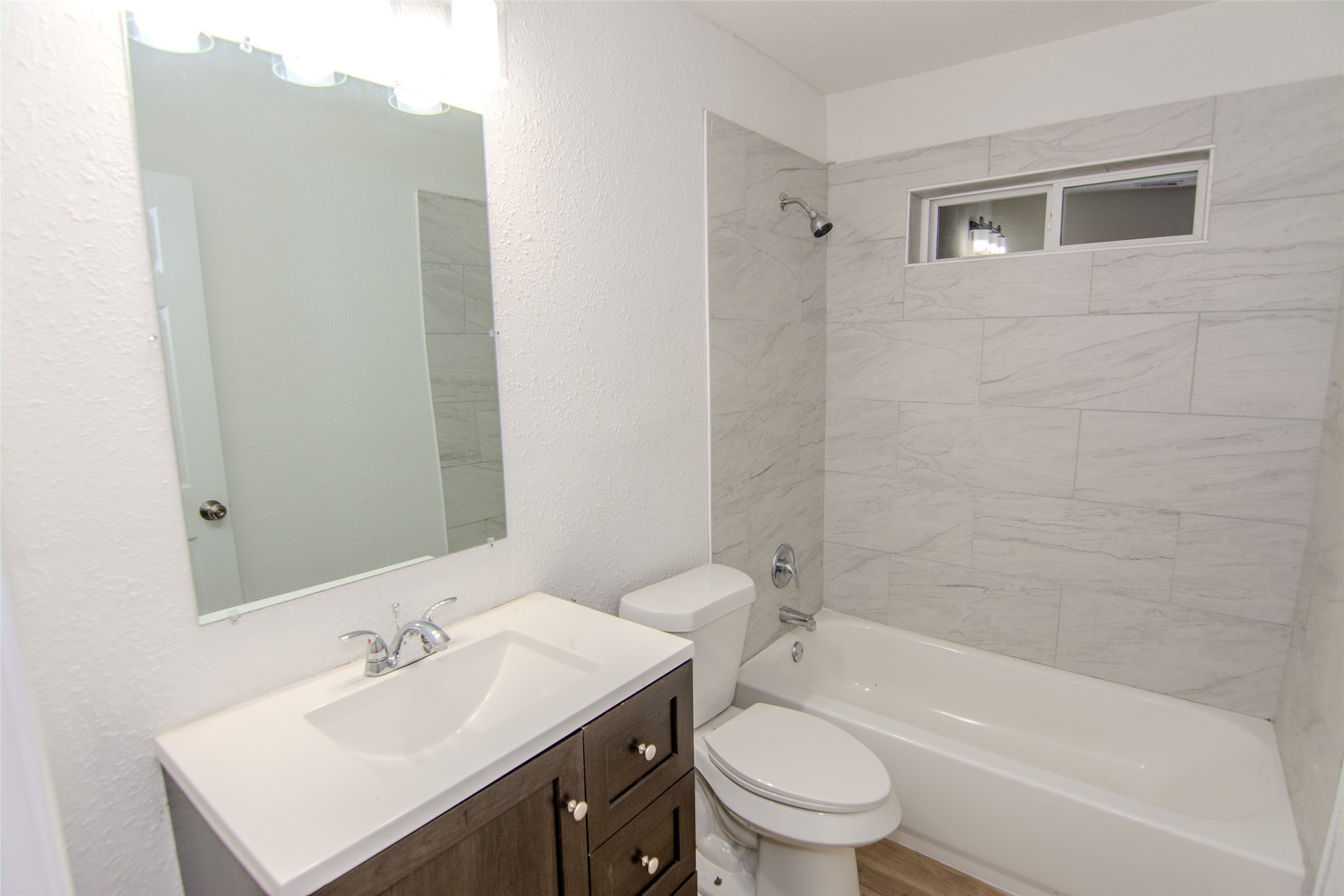 10815 Ritow Street Houston, TX 77089 - Photo 8 of 12 a bathroom with a sink toilet tub and shower