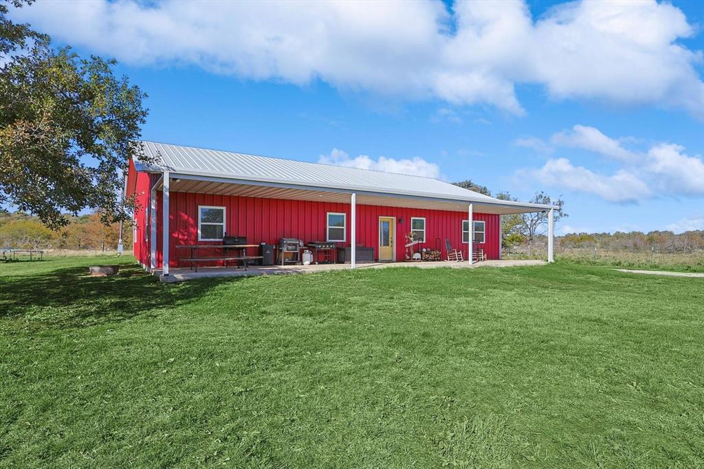 1161 Lynn Creek Road Jacksboro, TX 76458 - Photo 4 of 28 a view of a house with a backyard