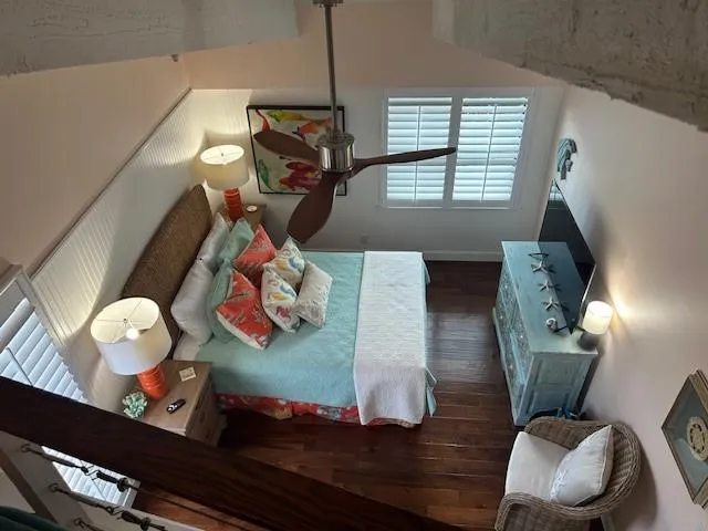 a bathroom with a granite countertop double vanity sink and a mirror