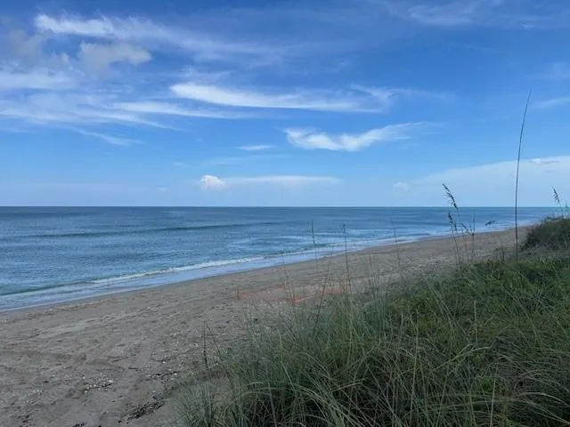 a view of a lake from a balcony