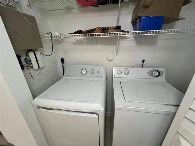 a utility room with dryer and washer