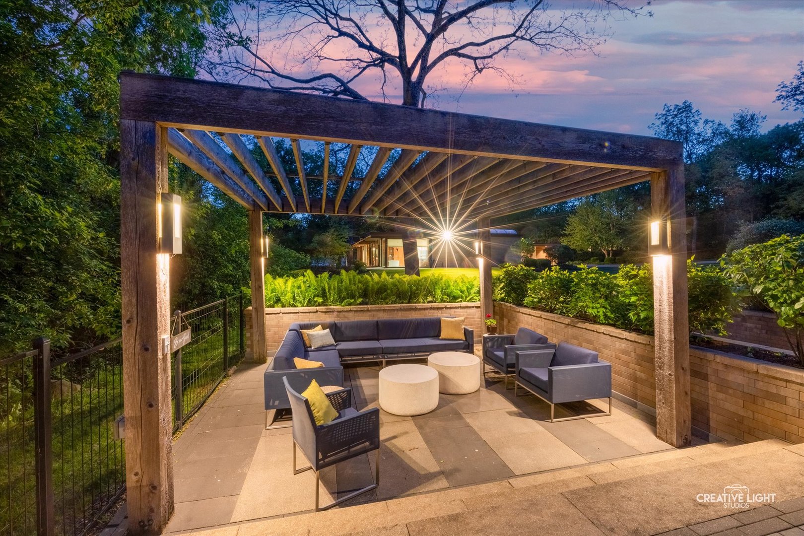 5N477 Curling Pond Road Wayne, IL 60184 - Photo 59 of 67 a view of patio with a table and chairs under an umbrella with a large tree