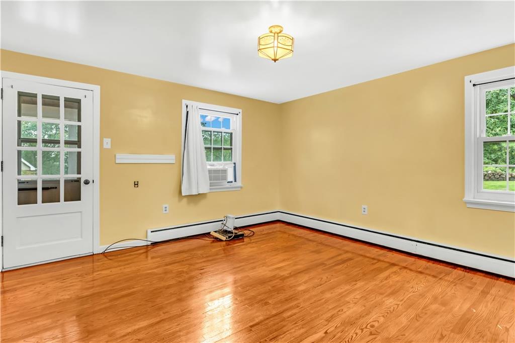 156 McIntyre Road Pittsburgh, PA 15237 - Photo 13 of 23 3rd bedroom on the main level with entry to the covered side porch, also makes for the perfect offices space.