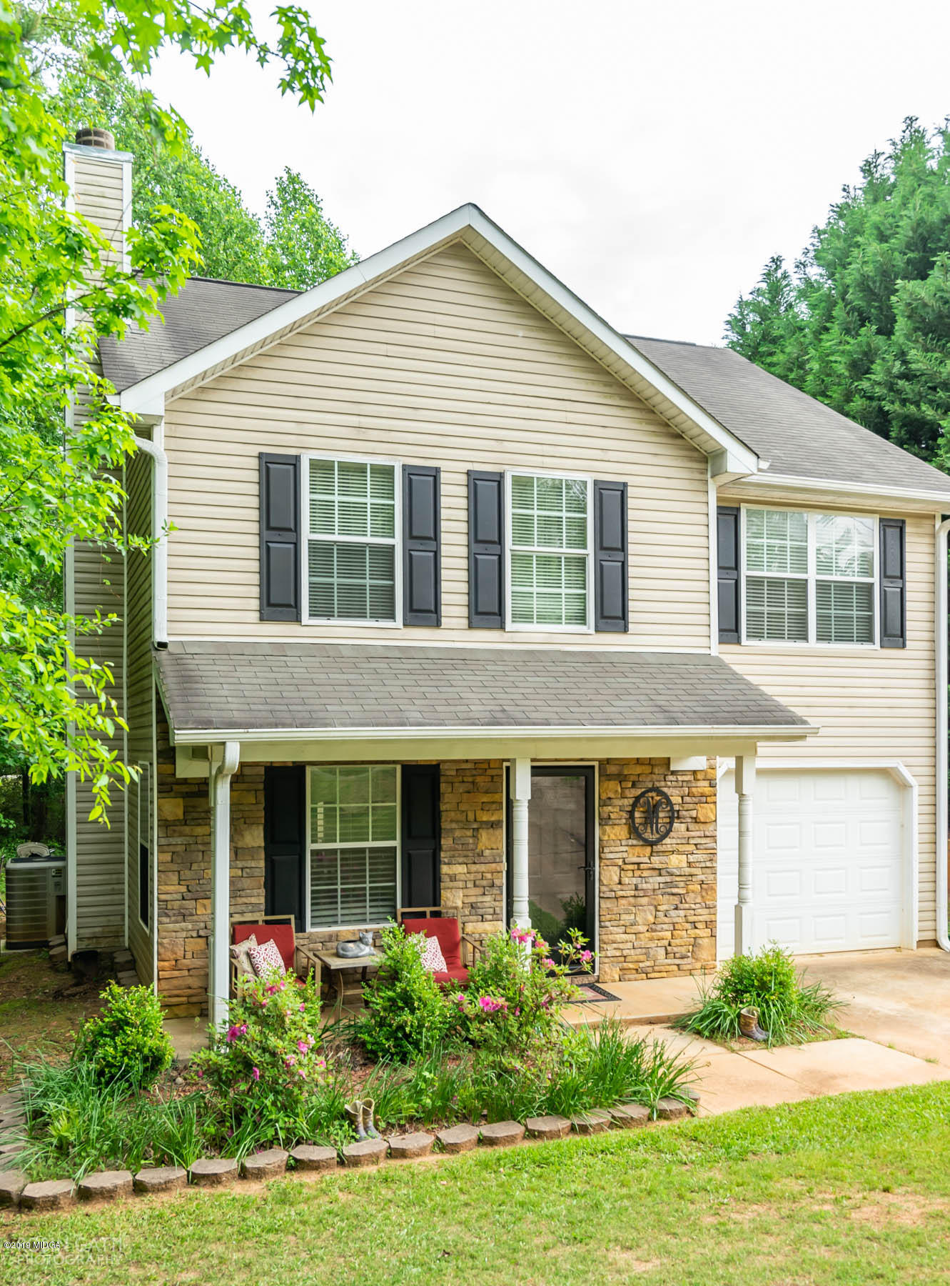 234 Autumn Ridge Court Gray, GA 31032 - Photo 2 of 24 a front view of a house with garden and porch