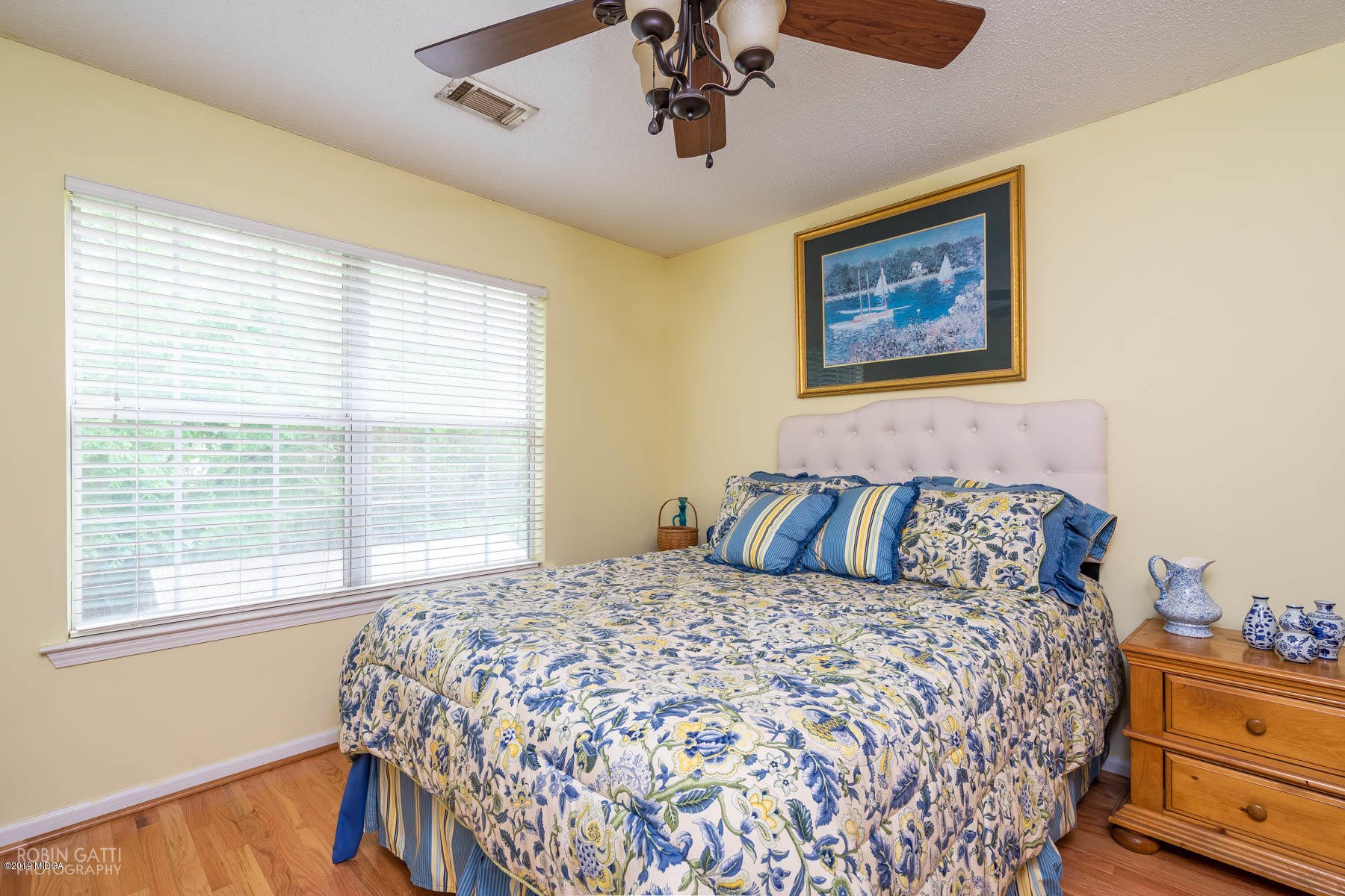 234 Autumn Ridge Court Gray, GA 31032 - Photo 18 of 24 a bedroom with a bed and a window
