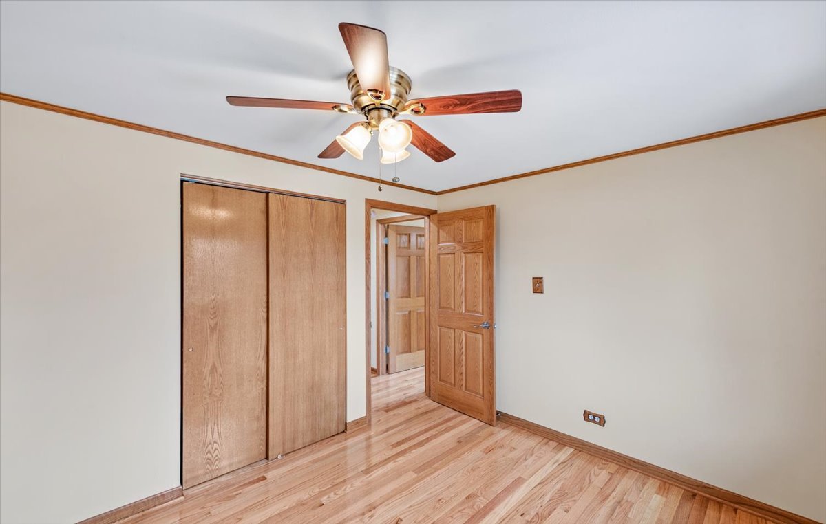 313 Springinsguth Road Schaumburg, IL 60193 - Photo 14 of 39 a view of room with wooden floor