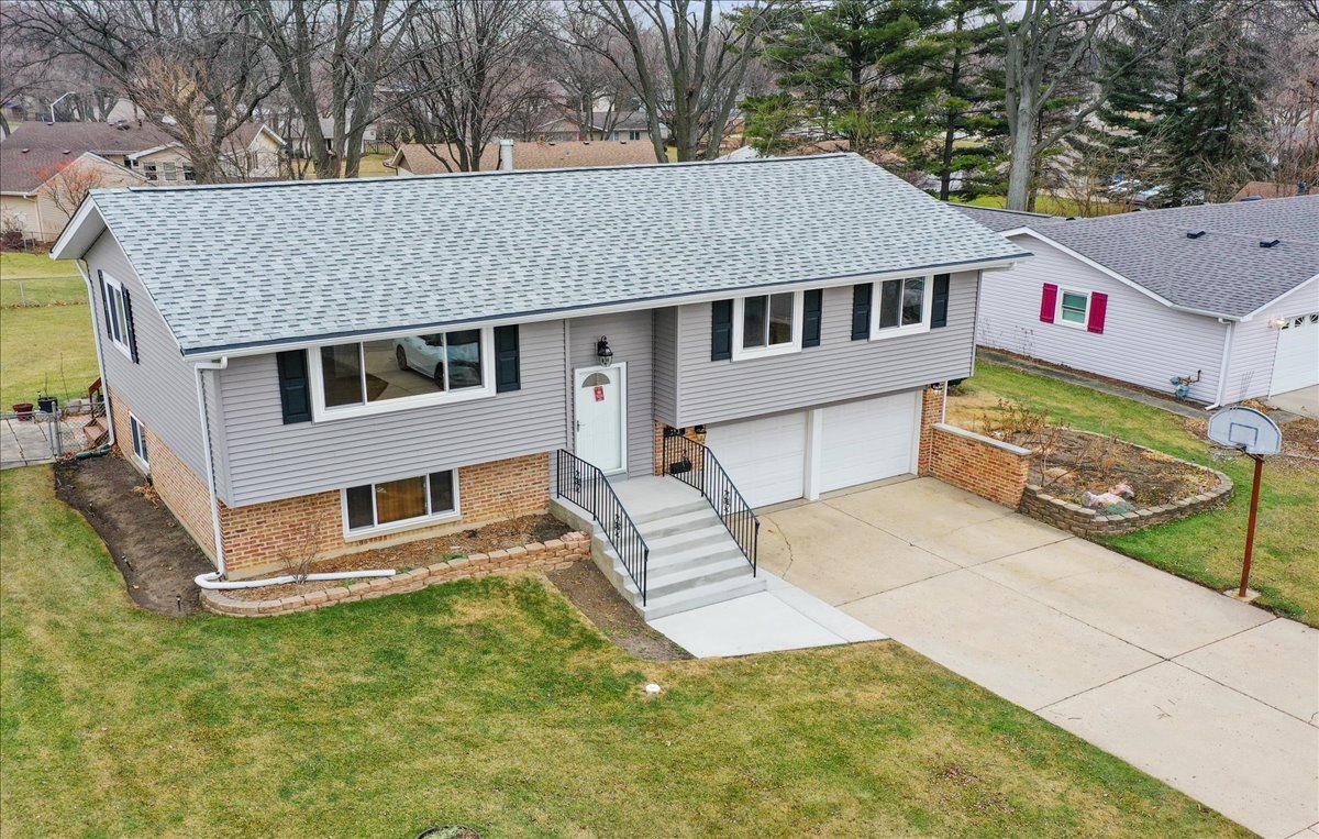 313 Springinsguth Road Schaumburg, IL 60193 - Photo 34 of 39 a aerial view of a house with a yard
