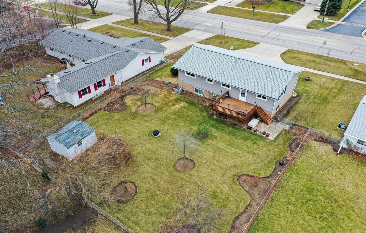 313 Springinsguth Road Schaumburg, IL 60193 - Photo 35 of 39 an aerial view of a house with a swimming pool