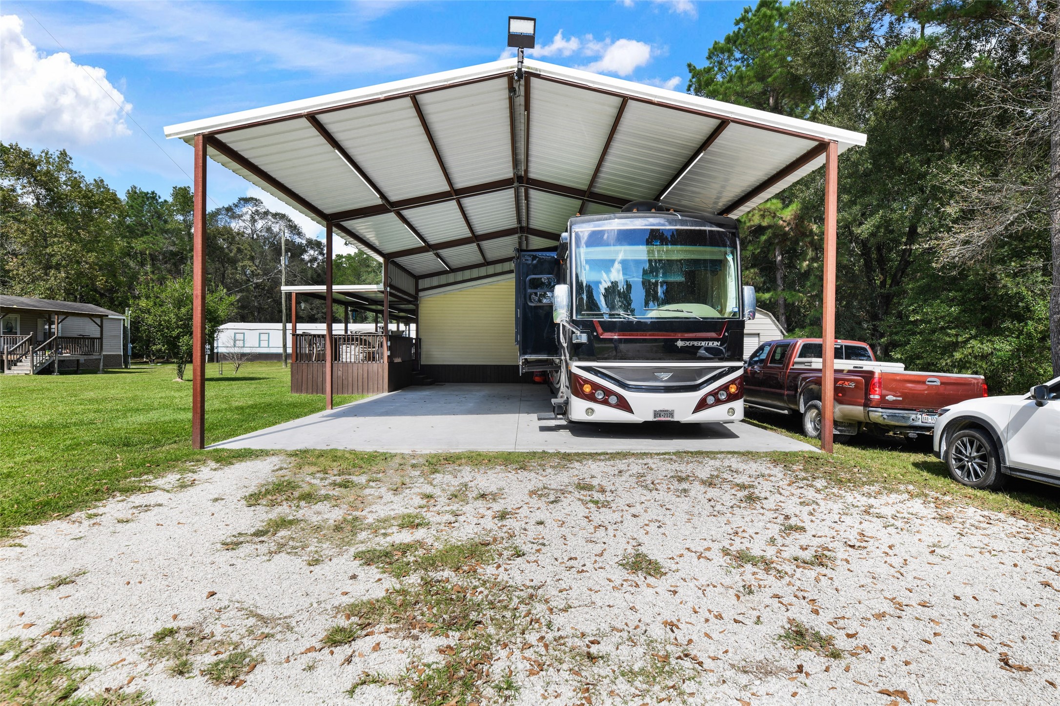18388 Cooper Road Conroe, TX 77302 - Photo 2 of 49 28x46 Rv cover with concrete slab