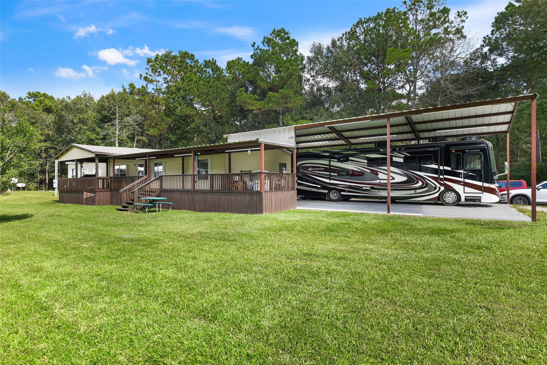 18388 Cooper Road Conroe, TX 77302 - Photo 3 of 49 4/2 home with porch across front and rv cover