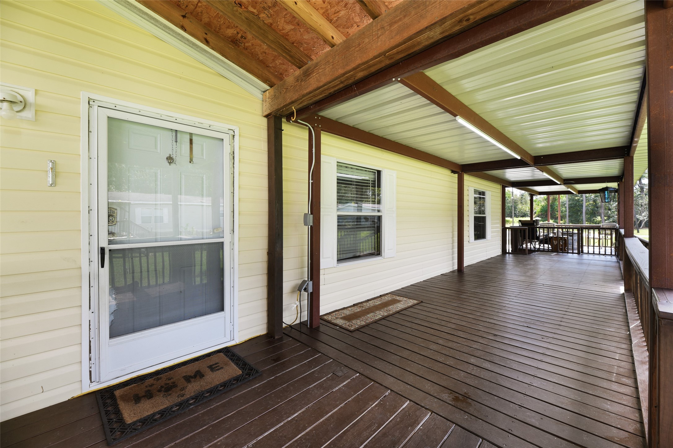 18388 Cooper Road Conroe, TX 77302 - Photo 4 of 49 Texas size porch to enjoy the great outdoors