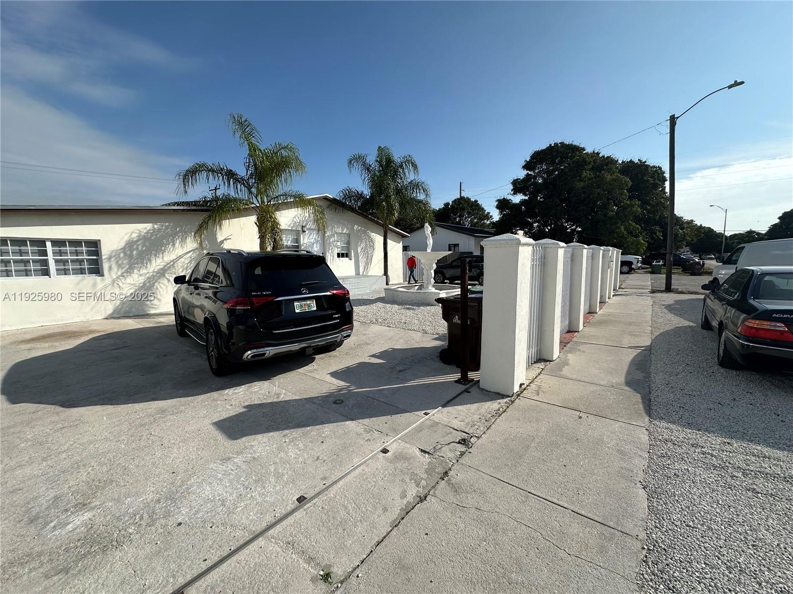 659 East 19th Street, Unit 659 Hialeah, FL 33013 - Photo 26 of 26 a view of a car parked in the parking lot