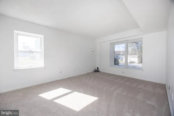 an empty room with windows