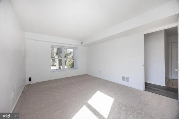 an empty room with windows