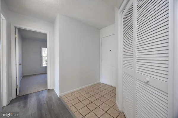 a view of a livingroom with wooden floor