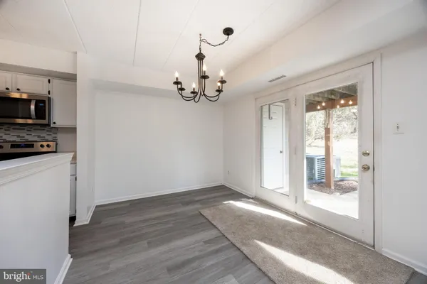 a view of a chandelier in a room