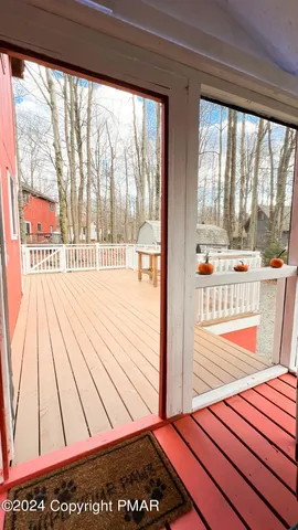 a front view of a house with iron fence