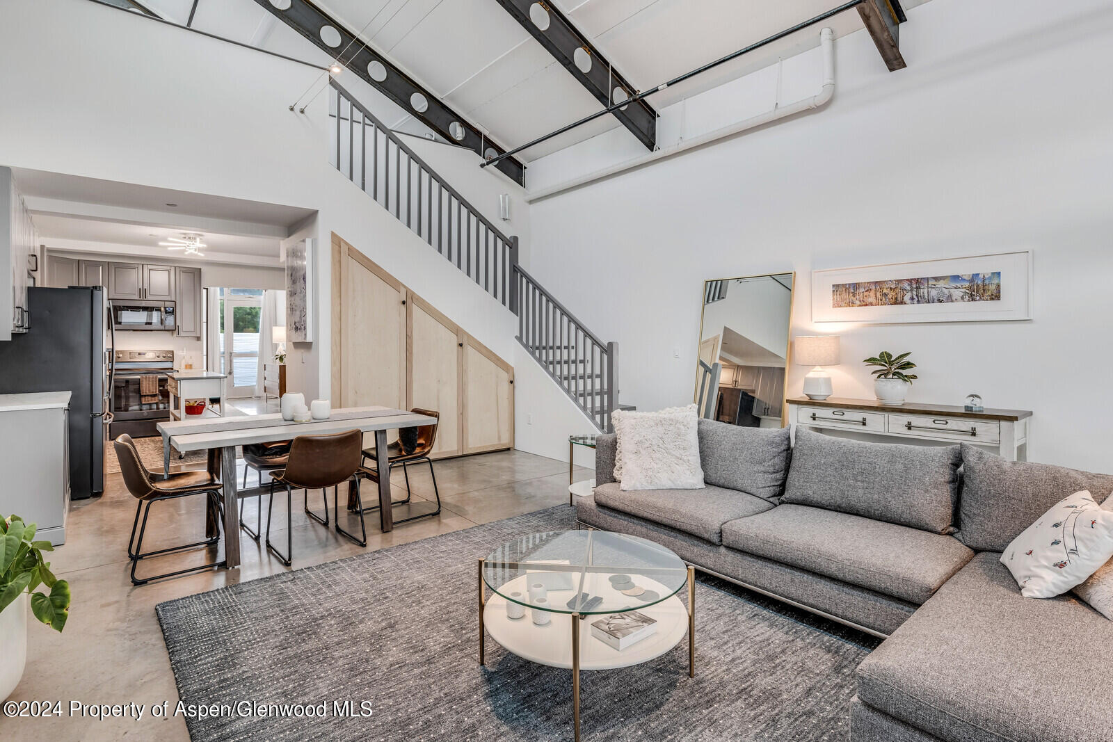 28 Widget Street, Unit 415 Basalt, CO 81621 - Photo 1 of 23 a living room with furniture a rug and a table