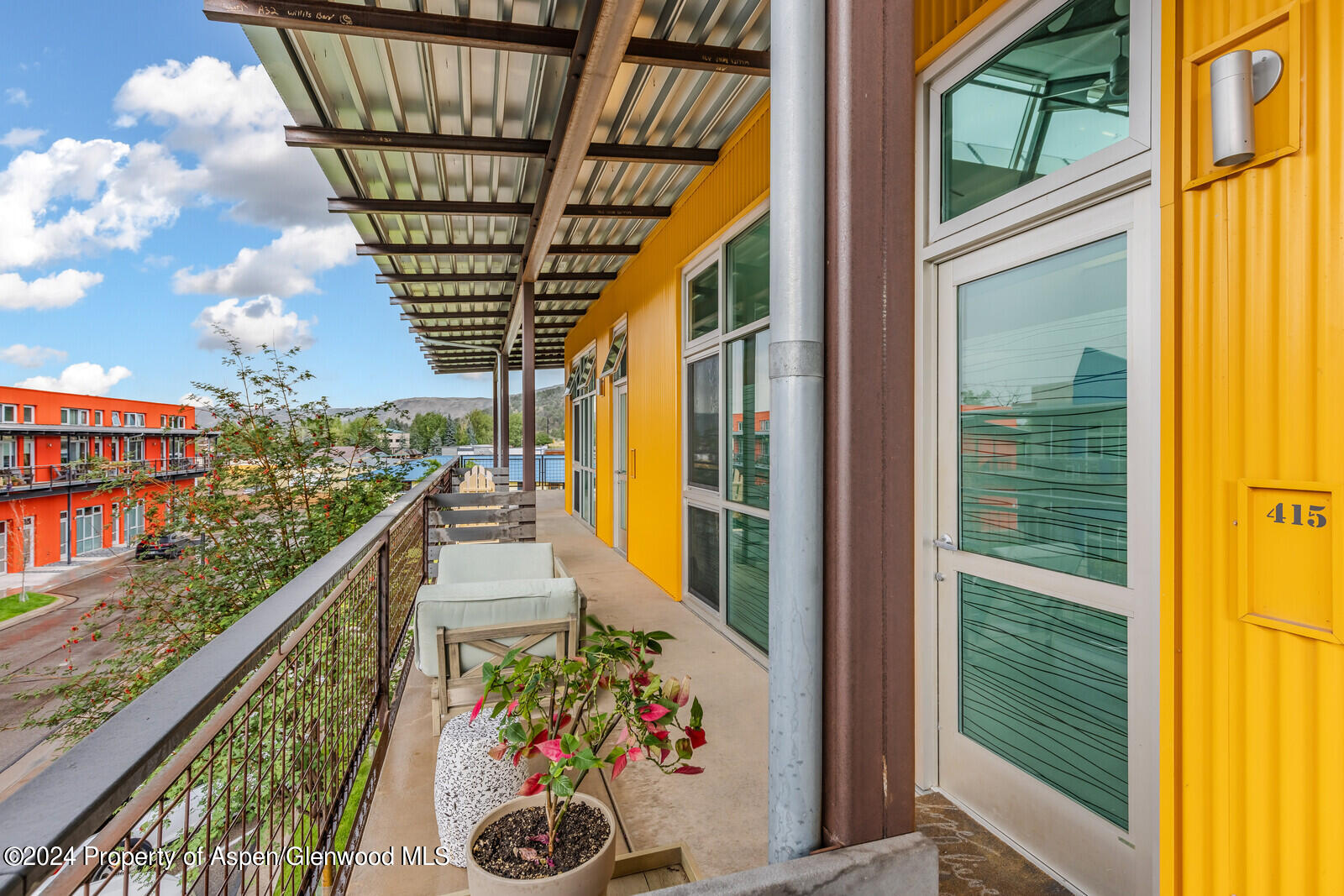 28 Widget Street, Unit 415 Basalt, CO 81621 - Photo 19 of 23 a balcony view with couple of swimming pool