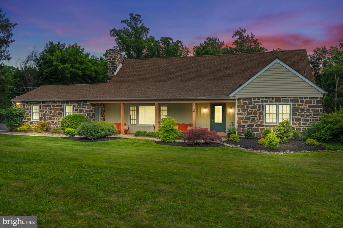121 Gwynedd Manor Road North Wales, PA 19454 - Photo 1 of 59 Charming stone home at twilight glow.