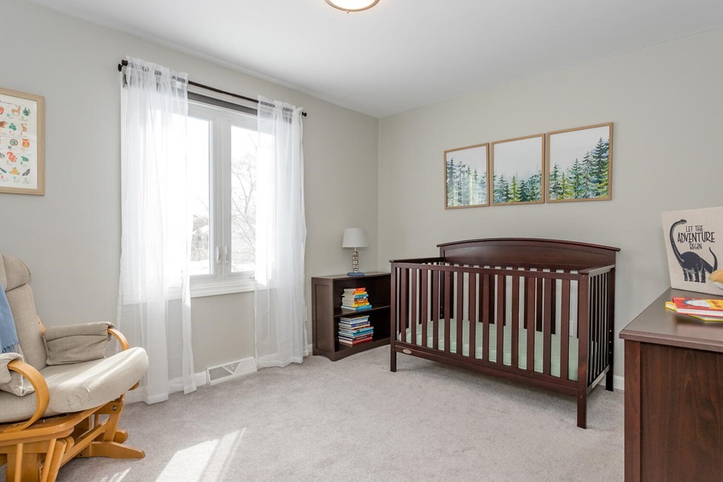 38 Clover Lane Stoughton, MA 02072 - Photo 14 of 21 a bedroom with furniture and a window