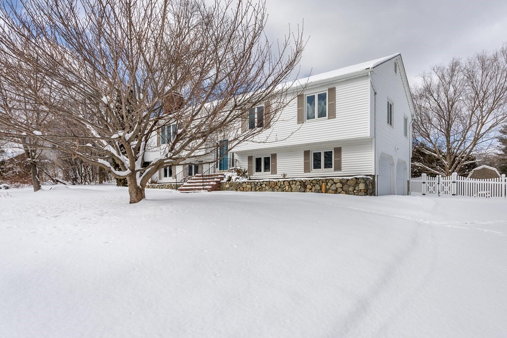 38 Clover Lane Stoughton, MA 02072 - Photo 2 of 21 front view of house with a yard