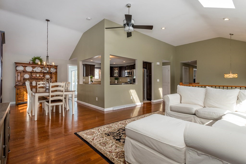 38 Clover Lane Stoughton, MA 02072 - Photo 5 of 21 a living room with furniture and wooden floor