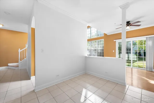 a view of an empty room and window