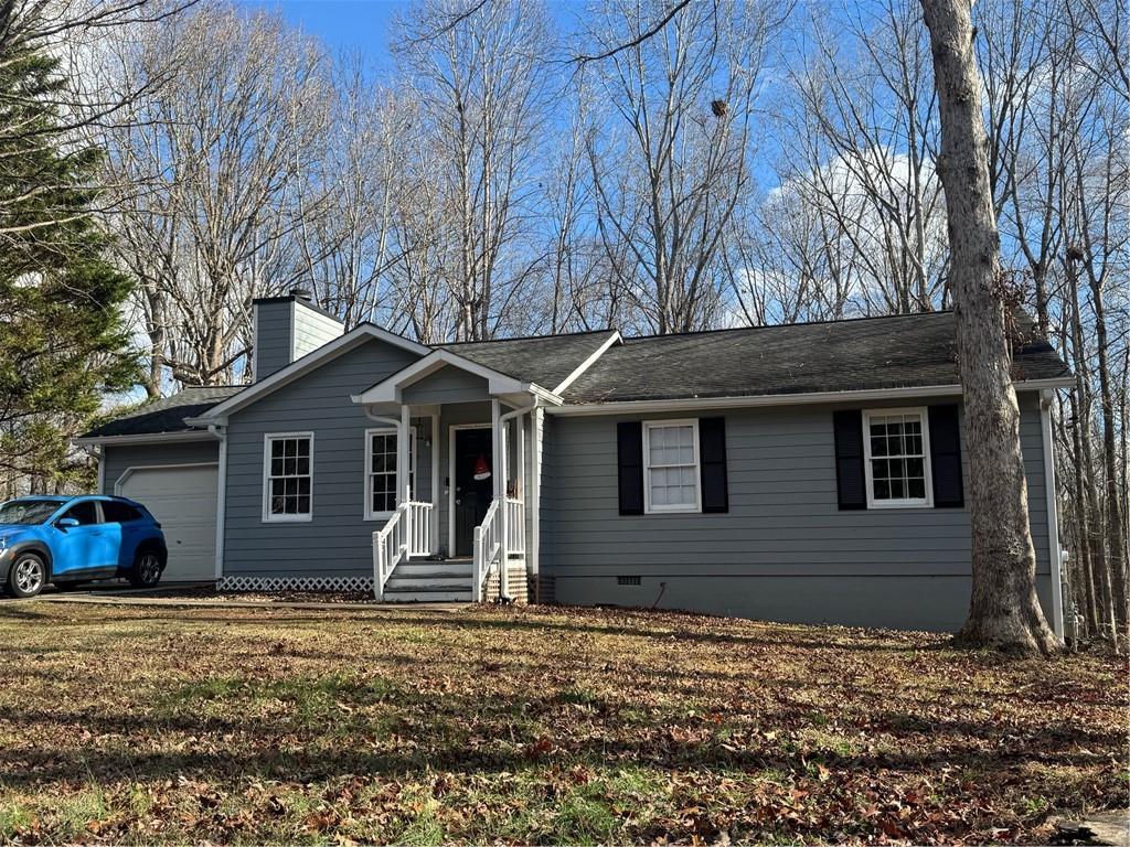 a house view with a backyard space