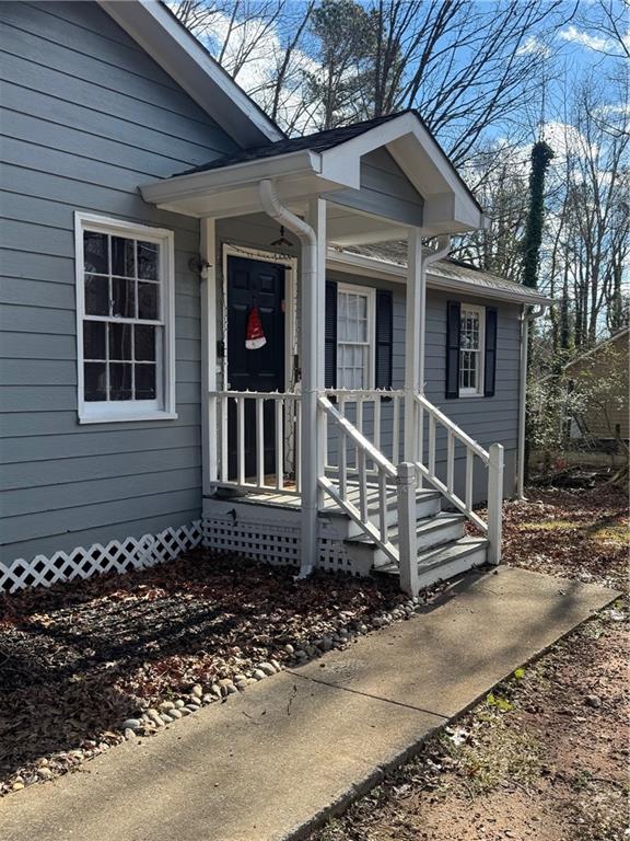 1019 Davis Mill Road South Dallas, GA 30157 - Photo 3 of 16 a front view of a house with a yard