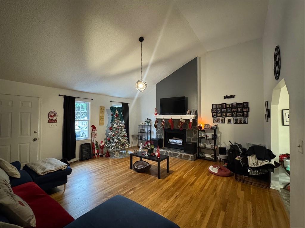1019 Davis Mill Road South Dallas, GA 30157 - Photo 5 of 16 a living room with furniture and a flat screen tv