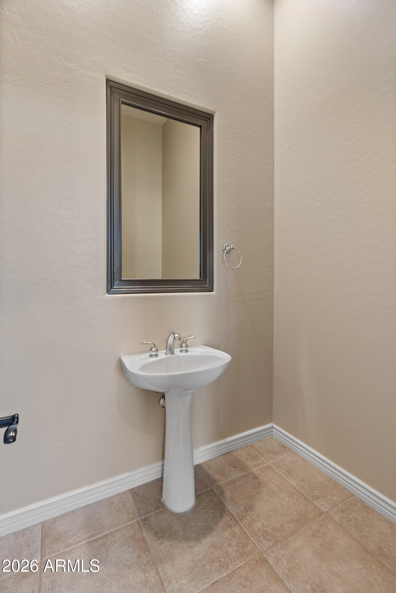 42420 North Back Creek Way Anthem, AZ 85086 - Photo 55 of 70 a bathroom with a sink and a mirror