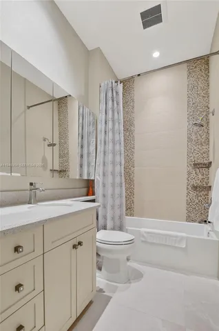 a view of a swimming pool with a garden