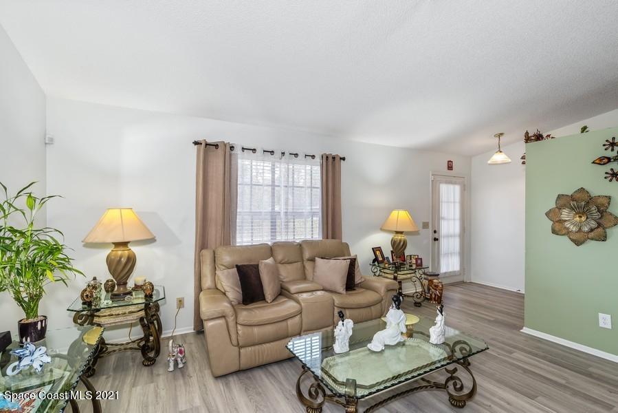 626 Waycross Road Southwest Palm Bay, FL 32908 - Photo 2 of 21 02_626WaycrossRdSW_1_LivingRoom_LowRes