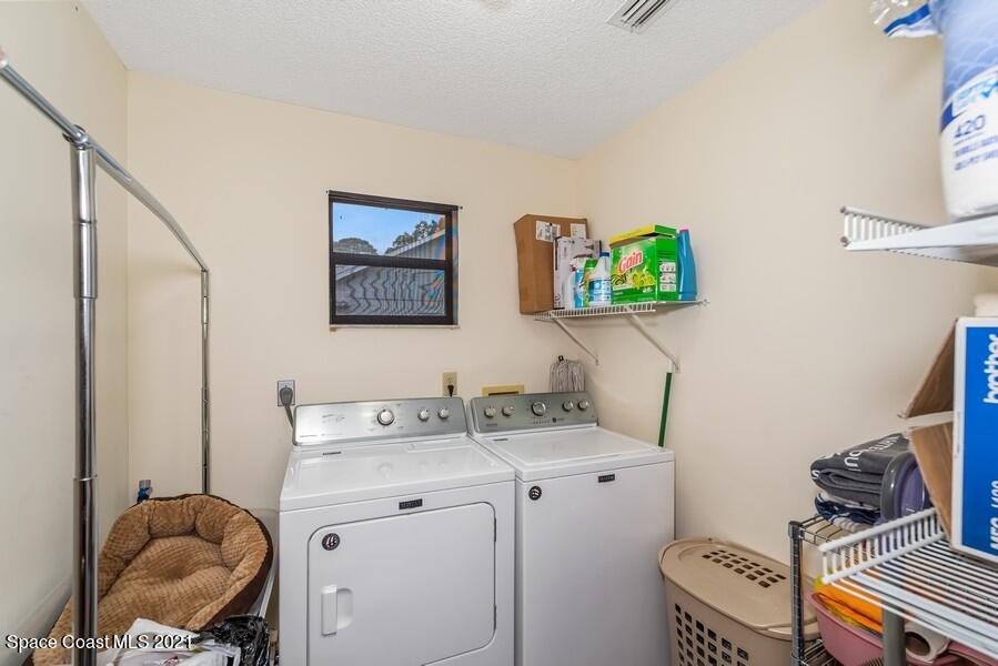 626 Waycross Road Southwest Palm Bay, FL 32908 - Photo 14 of 21 14_626WaycrossRdSW_44_LaundryRoom