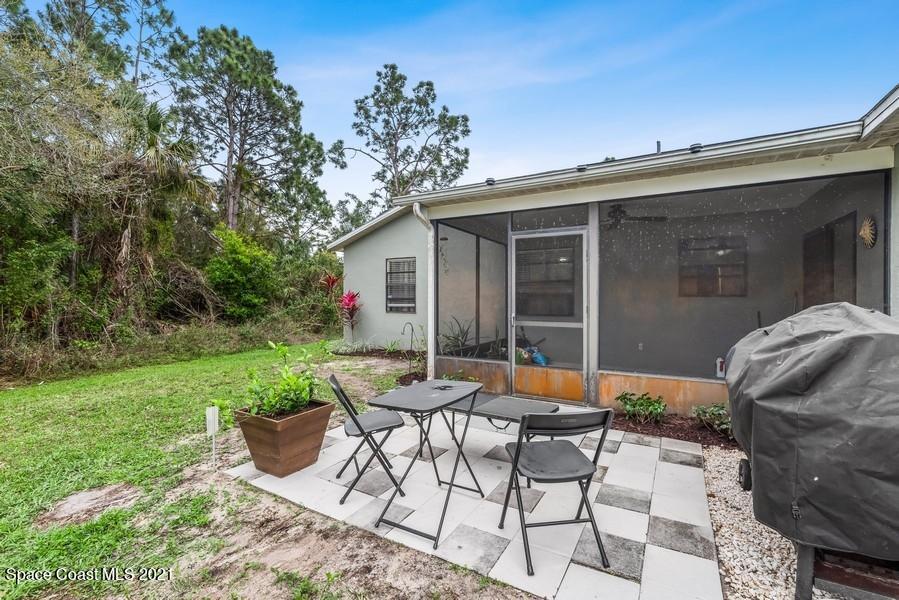 626 Waycross Road Southwest Palm Bay, FL 32908 - Photo 16 of 21 16_626WaycrossRdSW_85_Patio_LowRes