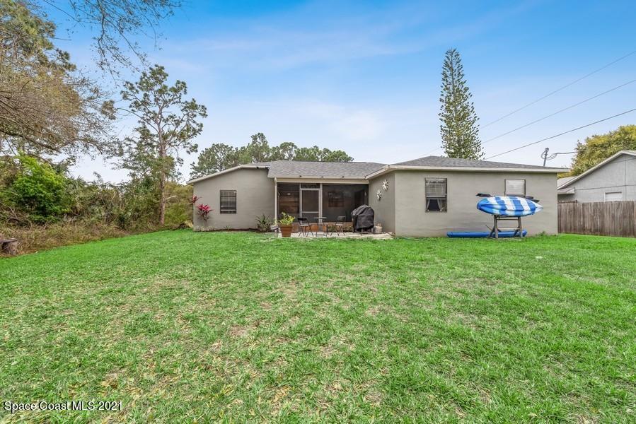 626 Waycross Road Southwest Palm Bay, FL 32908 - Photo 17 of 21 17_626WaycrossRdSW_59_RearView_LowRes
