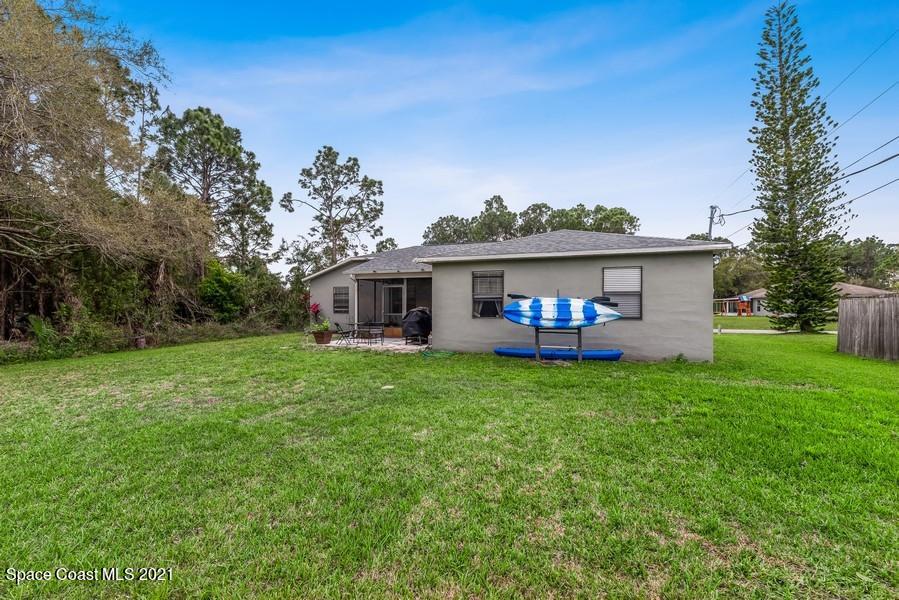 626 Waycross Road Southwest Palm Bay, FL 32908 - Photo 18 of 21 18_626WaycrossRdSW_59001_RearView_LowRes