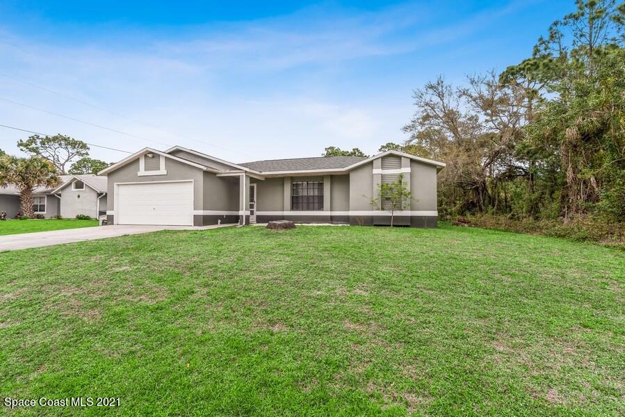 626 Waycross Road Southwest Palm Bay, FL 32908 - Photo 20 of 21 20_626WaycrossRdSW_300_FrontView_LowRes