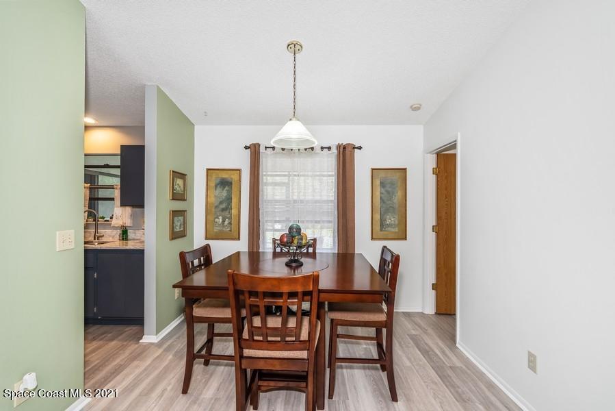 626 Waycross Road Southwest Palm Bay, FL 32908 - Photo 5 of 21 05_626WaycrossRdSW_2_DiningRoom_LowRes