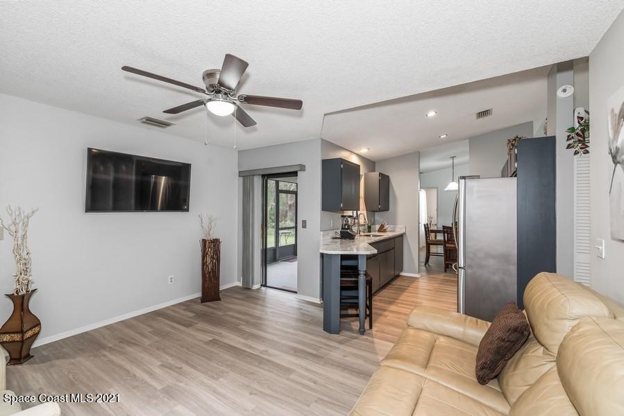 626 Waycross Road Southwest Palm Bay, FL 32908 - Photo 6 of 21 06_626WaycrossRdSW_3_FamilyRoom_LowRes