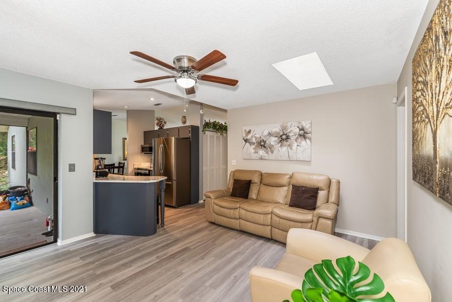626 Waycross Road Southwest Palm Bay, FL 32908 - Photo 7 of 21 07_626WaycrossRdSW_3001_FamilyRoom_LowRe