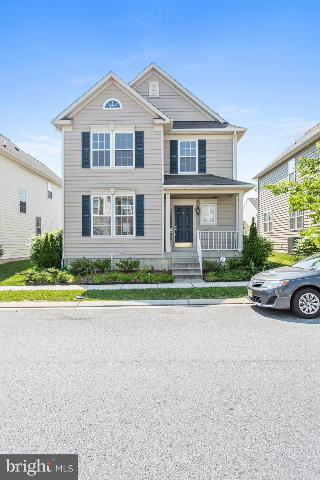 9637 Biggs Road Middle River, MD 21220 - Photo 1 of 30 a front view of a house with a yard and garage