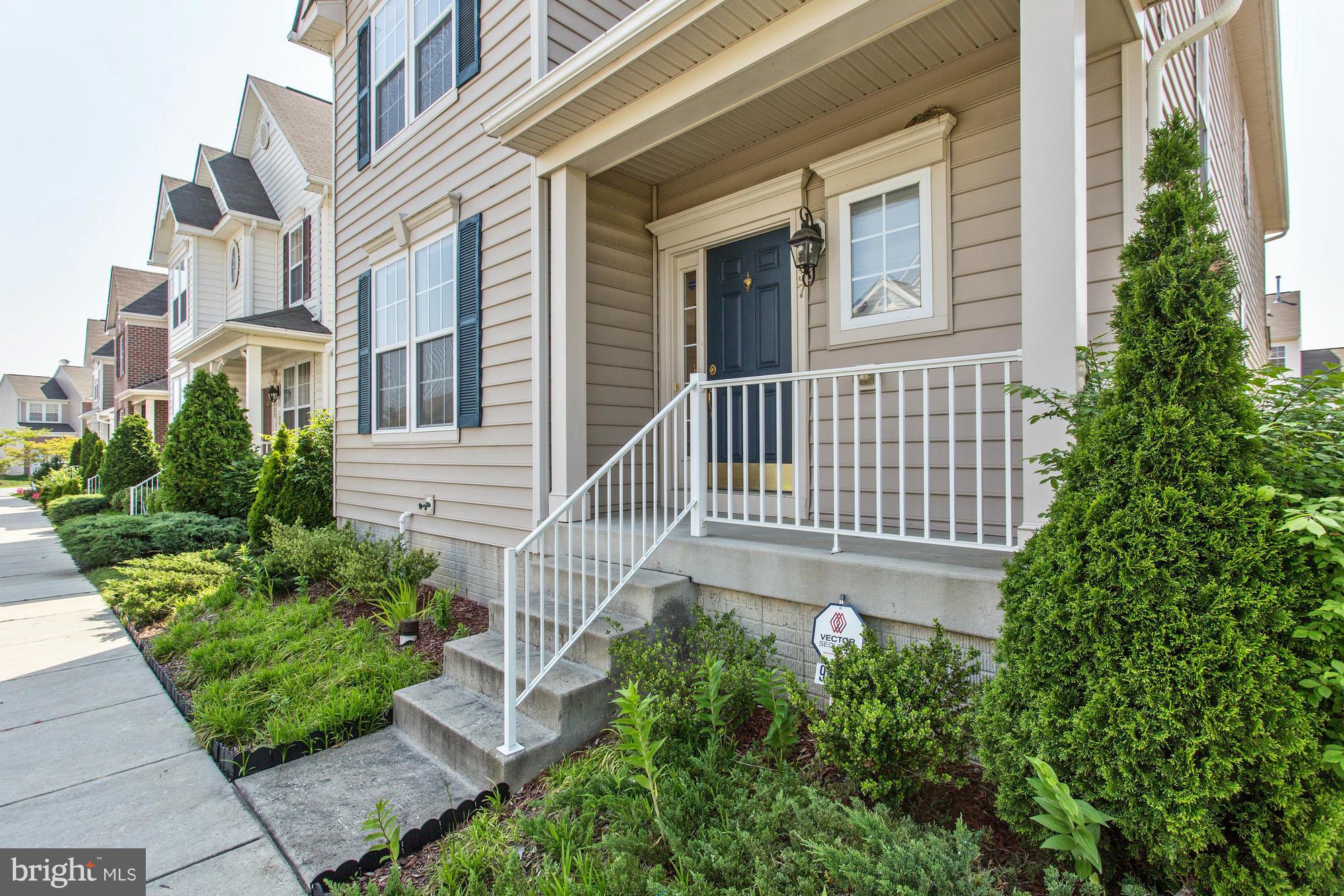 9637 Biggs Road Middle River, MD 21220 - Photo 2 of 30 a front view of a house with a garden