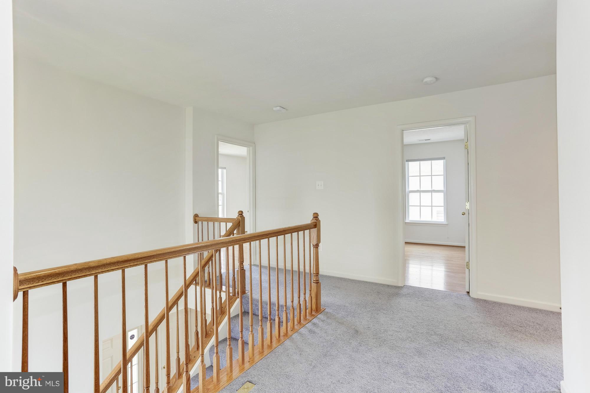 9637 Biggs Road Middle River, MD 21220 - Photo 19 of 30 a view of a hallway with windows