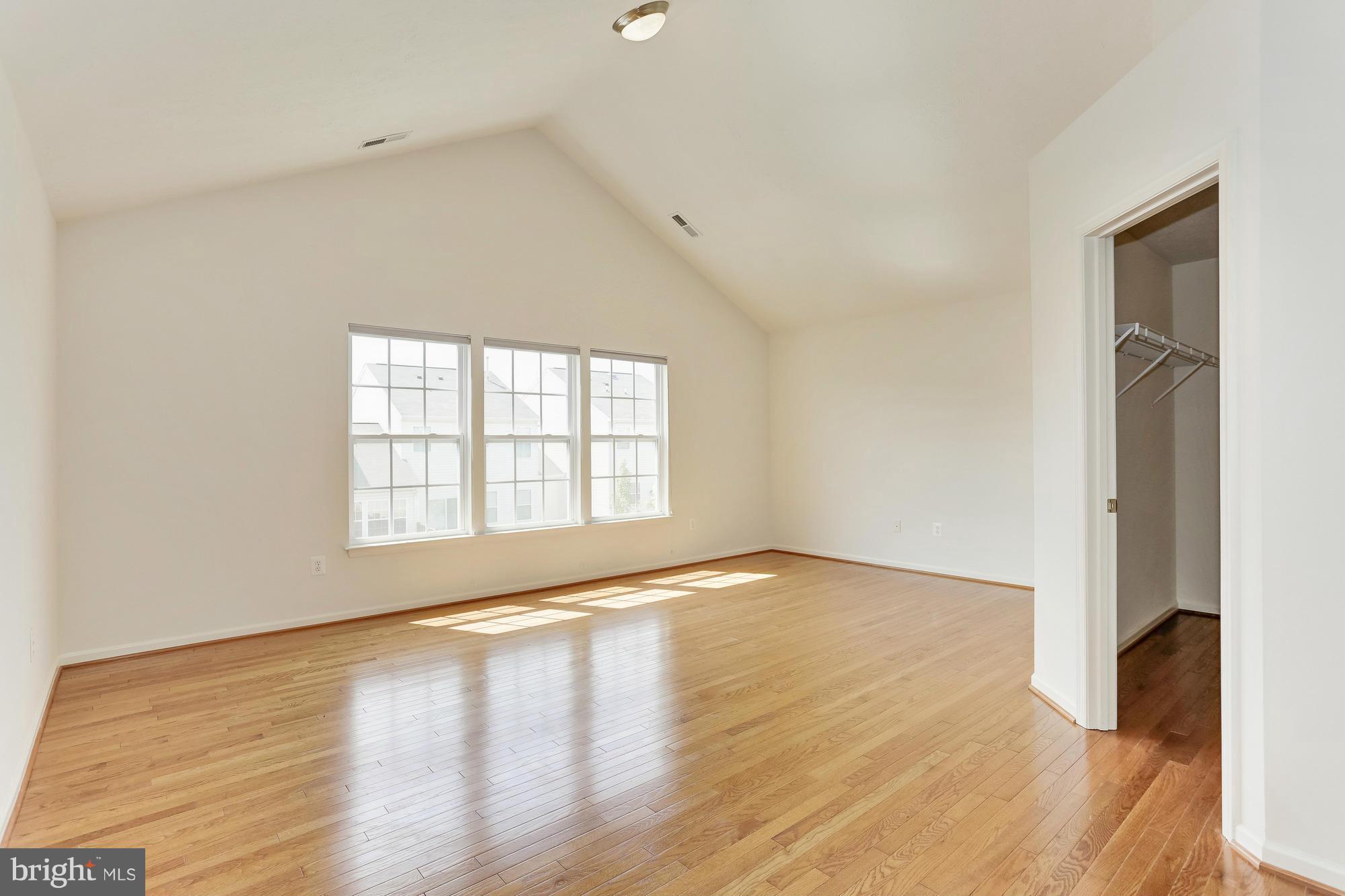 9637 Biggs Road Middle River, MD 21220 - Photo 20 of 30 an empty room with wooden floor and windows